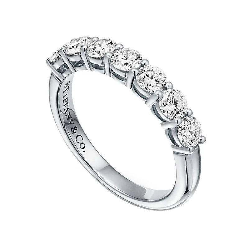 Channel - Set Women's Diamond Rings with Diamonds Securely Held in a Metal Groove for DurabilityTiffany & Co. Forever Band Platinum Ring with Half-Circle Radiant Round Diamonds