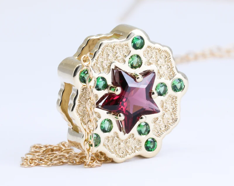 Opal and diamond engagement ring in a contemporary silver band with black - rhodium accents14K Yellow Gold Lace Pendant with Rhodolite Garnet Star and Tourmalines