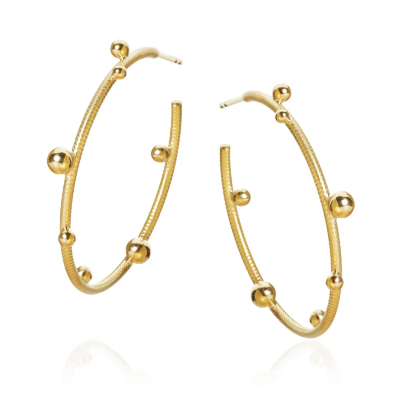 Statement hoop earringsLarge Delphis 18K Gold Hoops