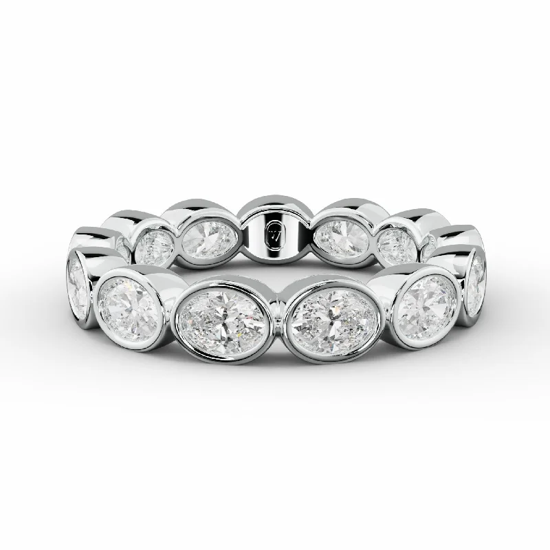 Art Deco - Inspired Women's Diamond Rings with Geometric Designs and Baguette - Cut Diamonds2.0 Carat East West Bezel Set Oval Diamond Eternity Band