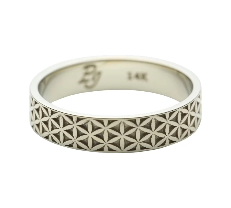 Round - cut diamond engagement ring with a twisted band design in 14K white goldFlower of Life Wedding Ring in 14k White Gold - Size 5.75