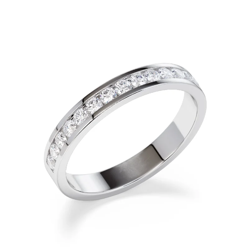 Emerald and diamond engagement ring in a vintage - inspired platinum band3mm Channel Set Round Diamond Eternity Ring