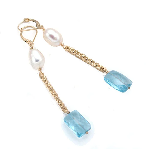 Tassel - decorated drop earrings for a stylish and playful touch14kt Caviar Bar