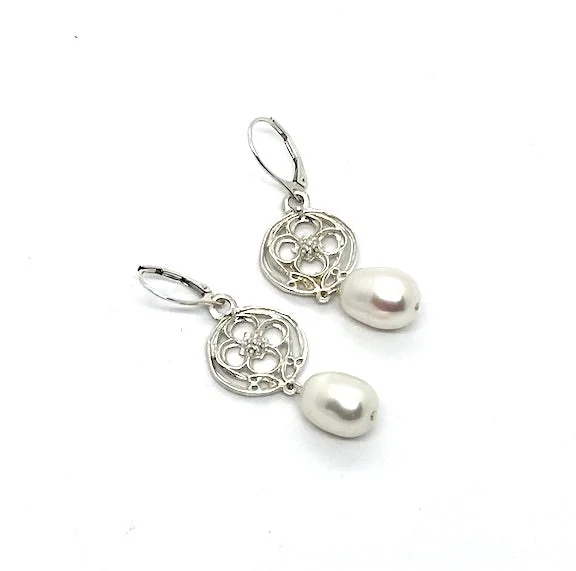 Victorian - era drop earrings with intricate detailsArden Charm Earring