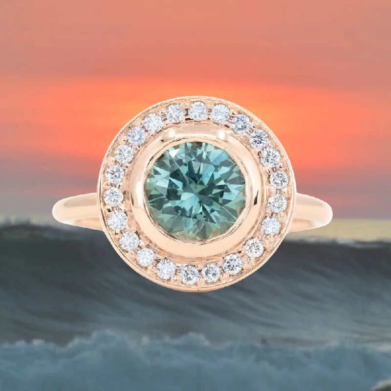 Alexandrite Gemstone Rings in Platinum with a Hidden Halo for a Rare and Luxurious Piece1.95ct Teal Montana Sapphire With Bezel Set Diamond Halo In 14k Rose Gold