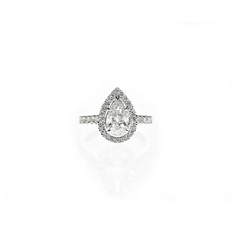 Vintage - Inspired Engagement Rings with Filigree Work and Emerald - Cut Center StonePear Shaped Ring with Diamond Halo