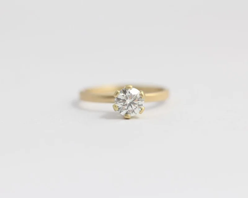 Marquise Cut Engagement Rings with a Channel - Set Diamond Band18ct Yellow gold Engagement Ring with 6 Claw Set Ethical Diamond