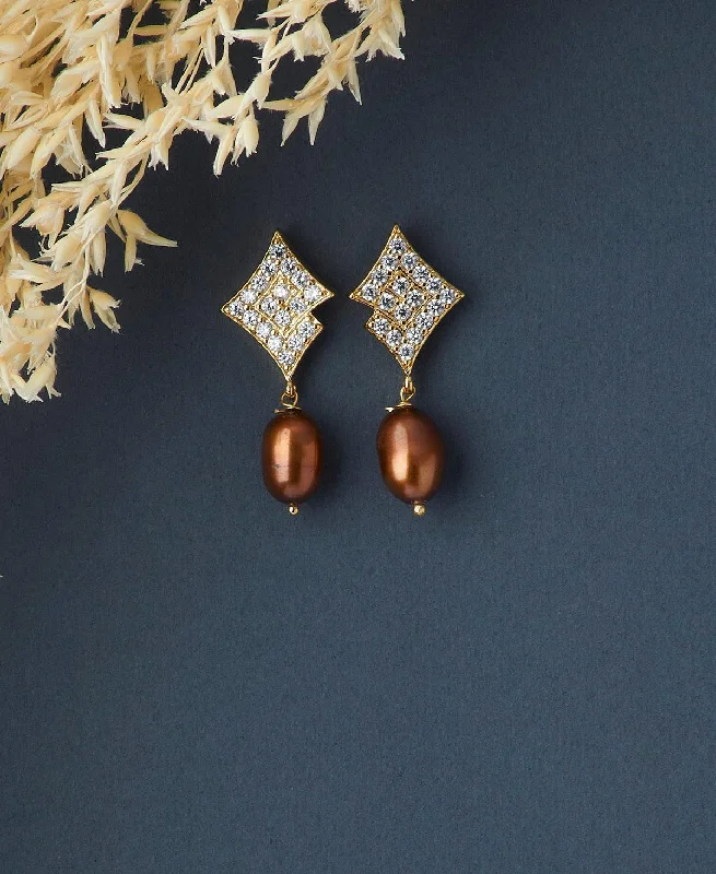 Leather - Inlaid Stud Earrings in Brown for a Rustic and Unique DesignDelicate Stone Studded Pearl Hanging Earring